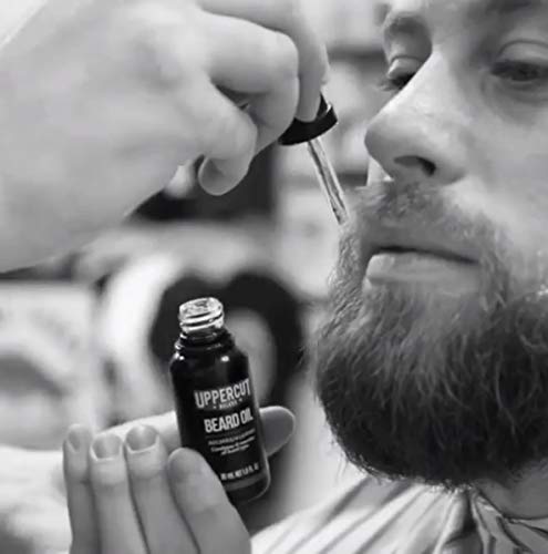 Uppercut Deluxe Beard Oil, Lightweight Beard Conditioner with Essential Oils to Nourish the Beard, Smooth Application and Light Finish, Patchouli and Leather Scent 30ml