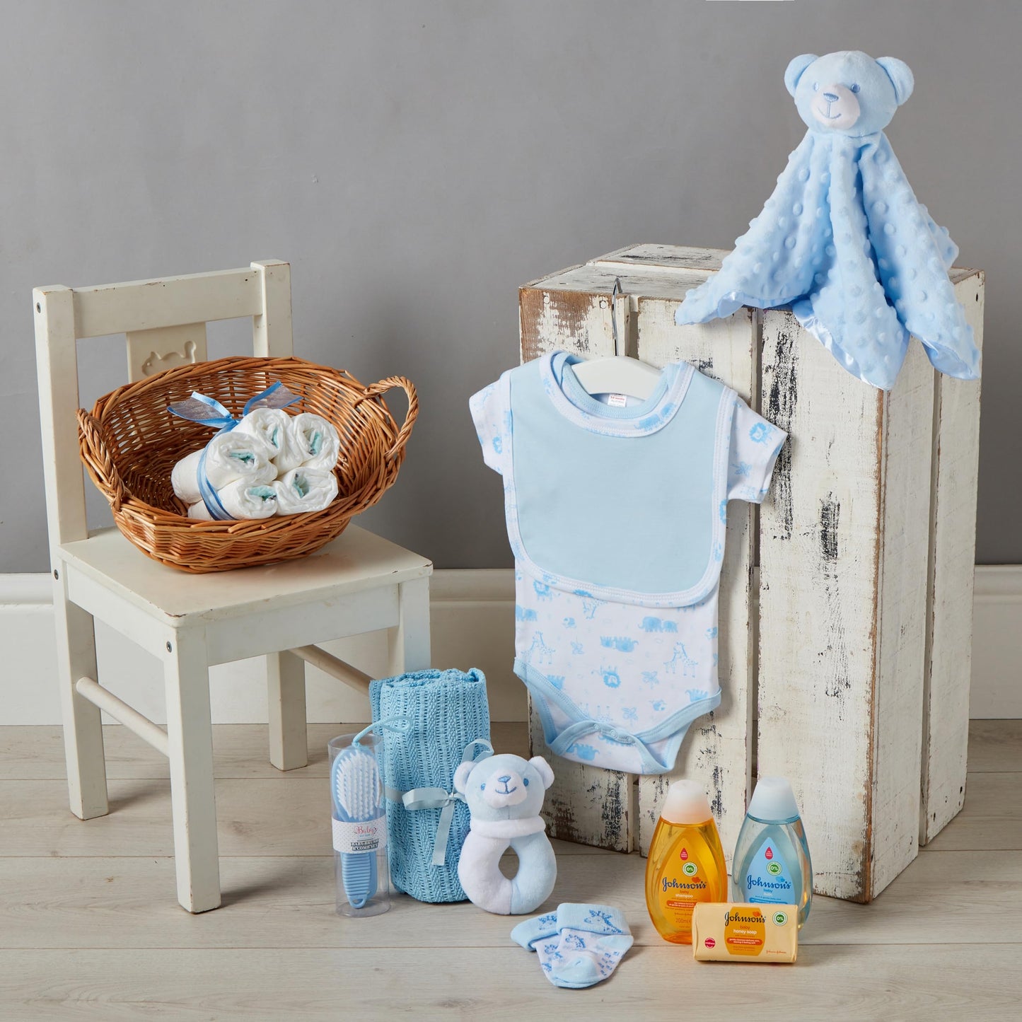 Baby Box Shop - 17 Baby Essentials for Newborn Boy Perfect as Christenings - Baby Boy Gifts, Baby Hamper for Newborn Boy in Rattan Basket (Blue) Standard Blue